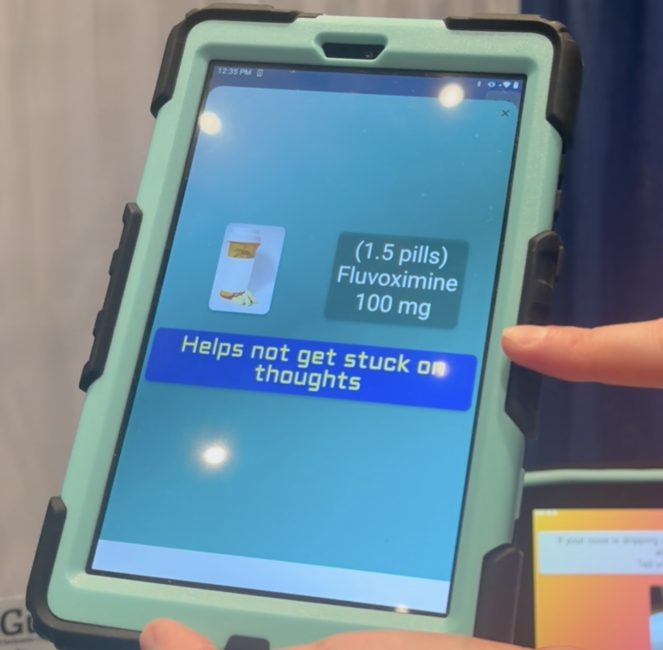 Screenshot of MPower Me being demonstrated to show medication reminder